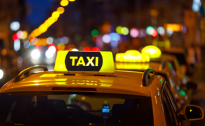 Yellow taxi at night traffic