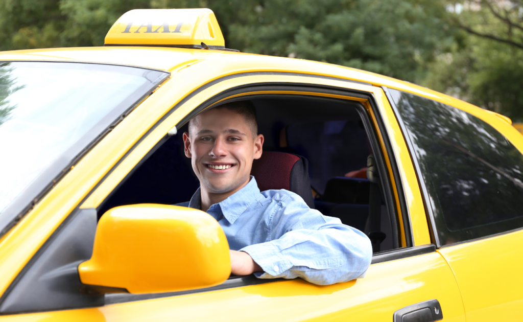 A happy taxi driver